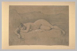 Naked woman lying on a rock