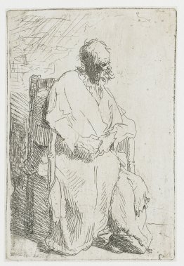 Old man in a long cloak sitting in an armchair