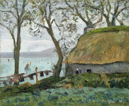 A cottage with thatched roof in Douarnenez