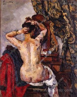 The woman in front of a mirror