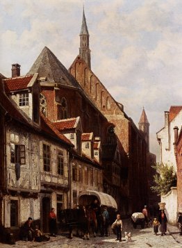 A Busy Street In Bremen With The Saint Johann Church In The Back