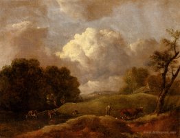 An Extensive Landscape With Cattle And A Drover