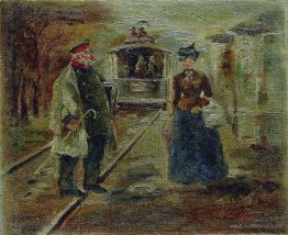 On the platform of the station. Street scene with a receding car