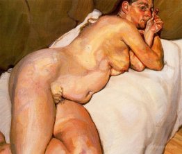 Naked woman on a sofa