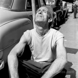 New York (Man Sunning on Street)