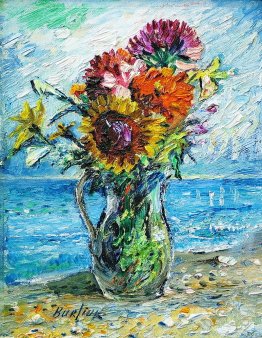 Bouquet of wild flowers with ocean background