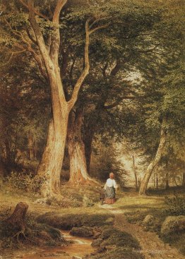 A woman with a boy in the forest