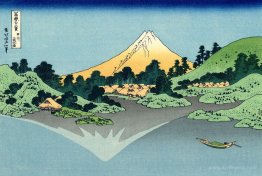 The Fuji reflects in Lake Kawaguchi, seen from the Misaka pass i