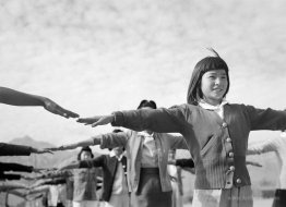 Female interns practicing calisthenics at Manzanar internment ca