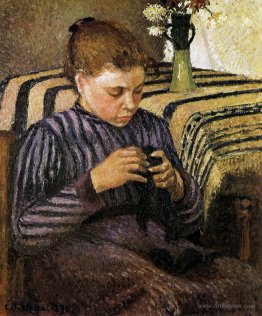 Young woman mending her stockings