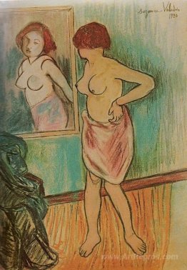 Woman Looking at Herself in the Mirror