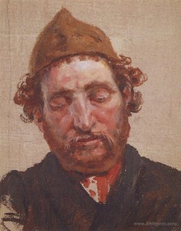 Head of red-headed man with yellow cap