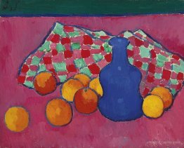 Blue vase with oranges