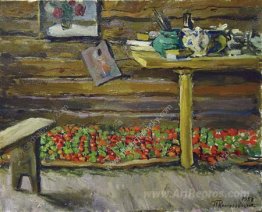 A workshop. Tomatoes on the bench.