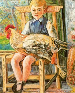 Boy sitting with a hen on his lap