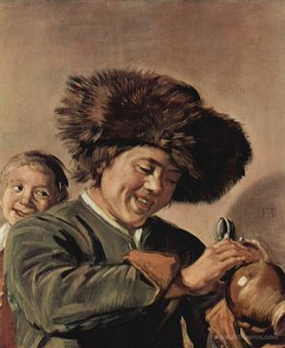 Two laughing boys with a beer mug