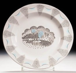 A dinner plate from his 'Travel' service designed for Wedgwood