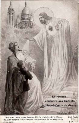 France blesses his children before the Sacred Heart of Jesus