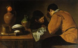 Two Young Men Eating At A Humble Table